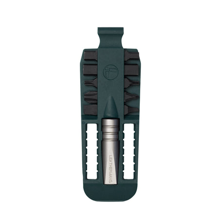 Translation missing: en.Forest Green Leatherman bit kit holder with multiple interchangeable screwdriver black bits arranged on both sides, and a silver extender, featuring the Leatherman logo embossed in the center