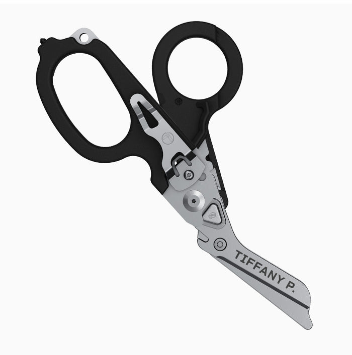 Translation missing: en.Custom Leatherman Raptor Rescue shears with engraved name on the blade, featuring personalized customization for professional and emergency tools