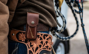 Translation missing: en.Man in wearing brown hoodie with Leatherman Heritage Sheath on belt