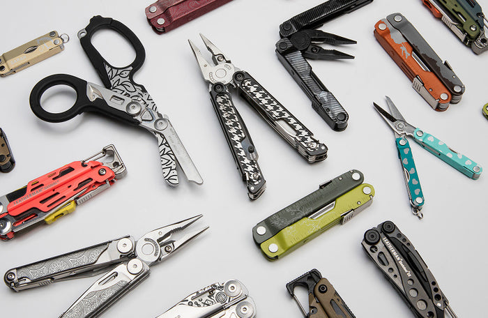 Translation missing: en.Assortment of Leatherman multi-tools, rescue shears, and pocket tools displayed on a light background, highlighting versatile and durable gift options from Leatherman