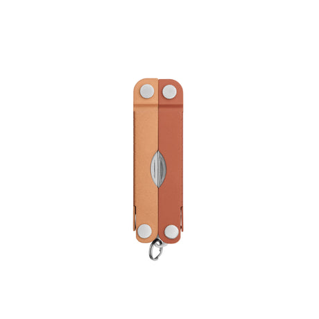 Translation missing: en.Pumpkin Spice Leatherman Micra® multi-tool closed, showcasing its compact design and keychain attachment