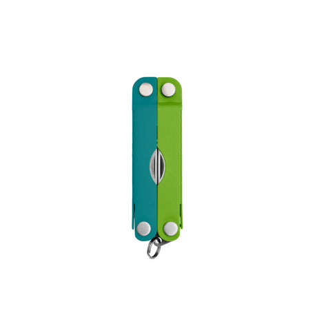 Translation missing: en.Teal Twist Leatherman Micra® multi-tool closed, showcasing its compact design and keychain attachment