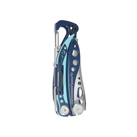 Translation missing: en.Nightshade Leatherman Skeletool® CX multitool folded, showing blue handles, cutout frame, and carabiner clip