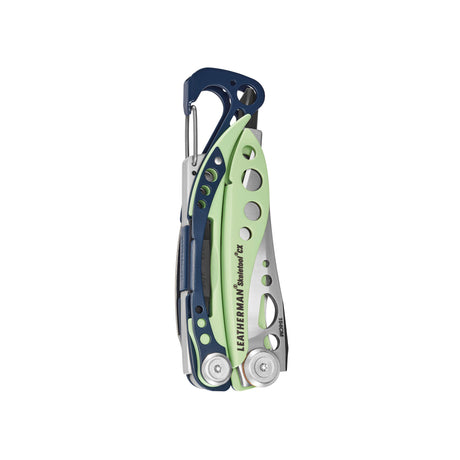 Translation missing: en.Folded Leatherman Skeletool CX multitool with Verdant and dark blue handles and cutout detailing
